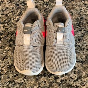 Gray, white and pink nikes